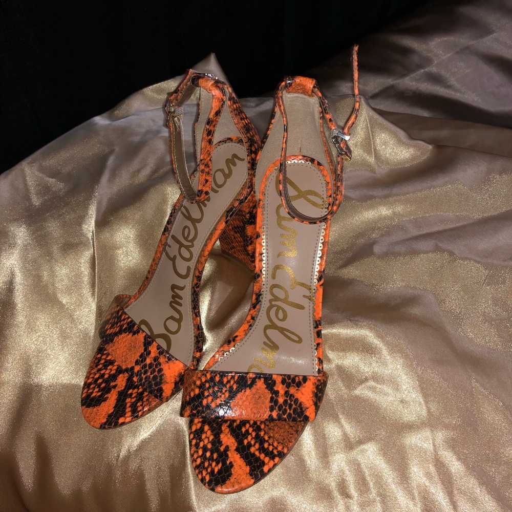 Orange and black snakeskin heels